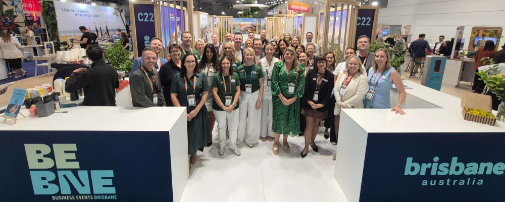 Group photo of the representatives of the Brisbane stand at AIME trade show
