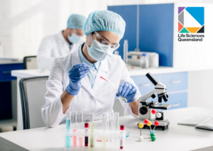 Life Sciences Queensland - Scientist using lab equipment and microscope