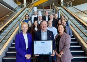 Stuart Moore, CEO and Founder of EarthCheck presents Master Certification to the BCEC team