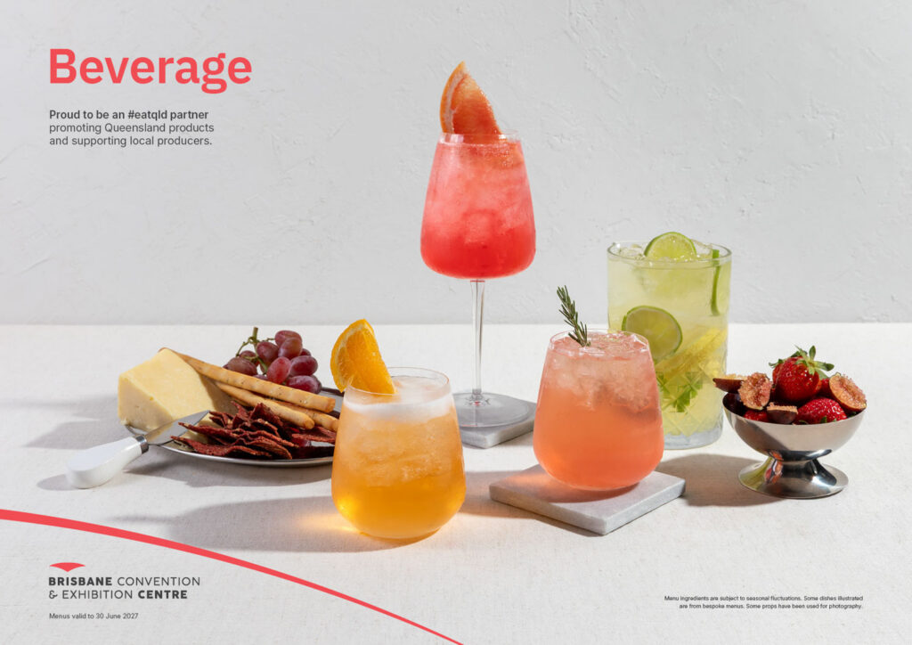 Colorful beverages are displayed at the Brisbane Convention & Exhibition Centre, ready for enjoyment.